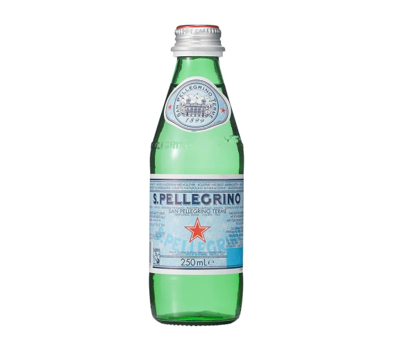 sparkling water served in green glass bottle