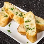 garlic cheese bread al forno baked with parmesan and mozzarella cheese