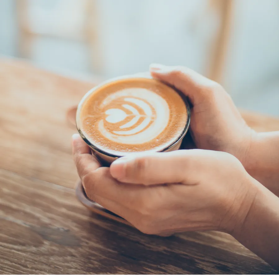Coffee with a design on its top